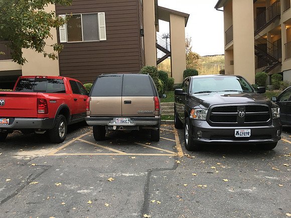 Tenant parking in no parking zone.